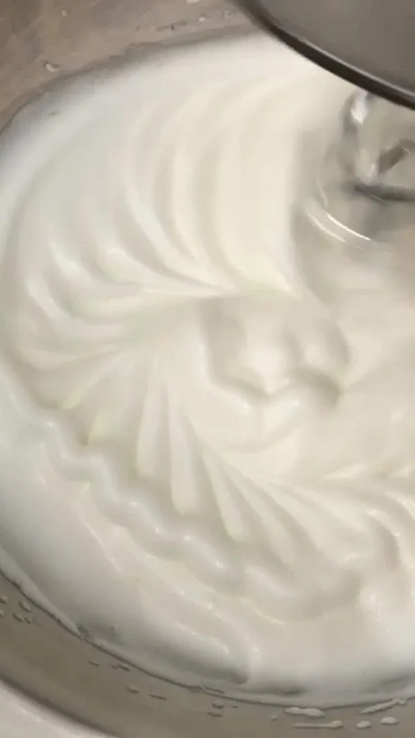 Angel Food Cupcakes Beat Egg Whites with Superfine Sugar