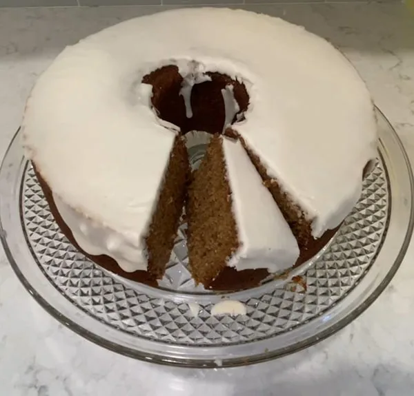 Apple Spice Cake with Fresh Apples Cutting the Cake