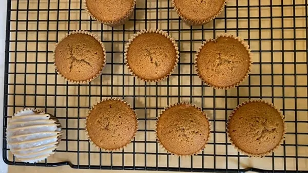 Coffee Cupcakes with Instant Coffee Pipe Coffee Icing Over the White Icing