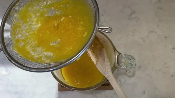Easy Lemon Curd Scrape Bottom of Strainer