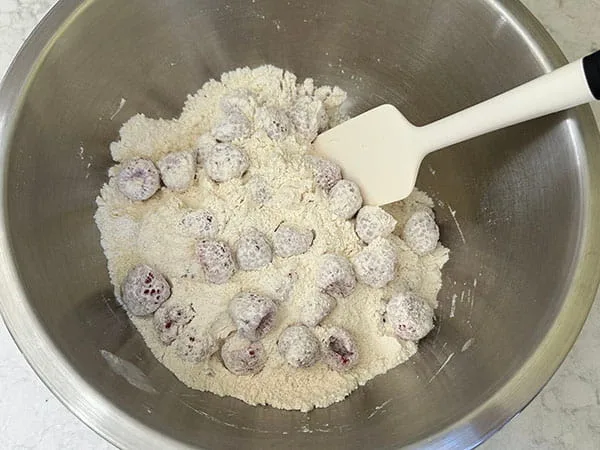 Raspberry Muffins with Frozen Raspberries Fold Raspberries into the Flour Mixture